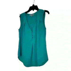 Daniel Rainn. Sleeveless blouse. Teal. Spike button detail.